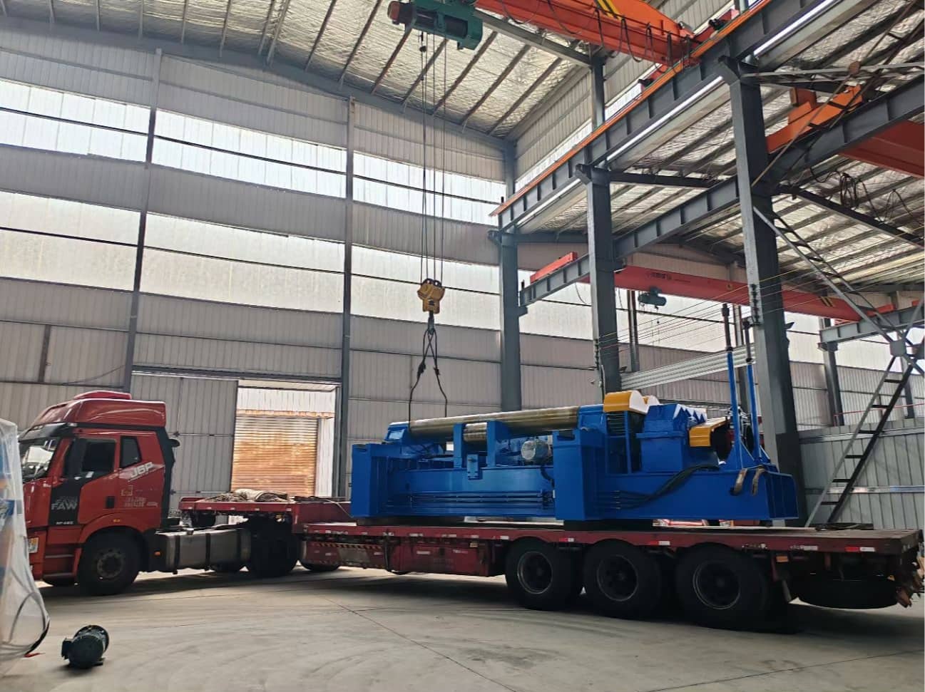 Step 3: CNC plate rolling machine loaded on truck for delivery